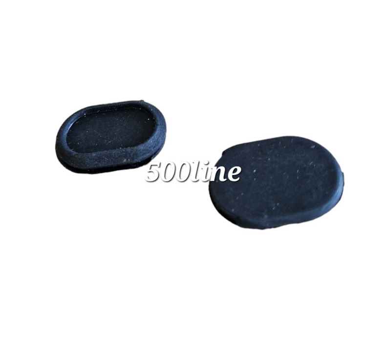 Pair of oval rubbers under the dashboard of a vintage Fiat 500 L